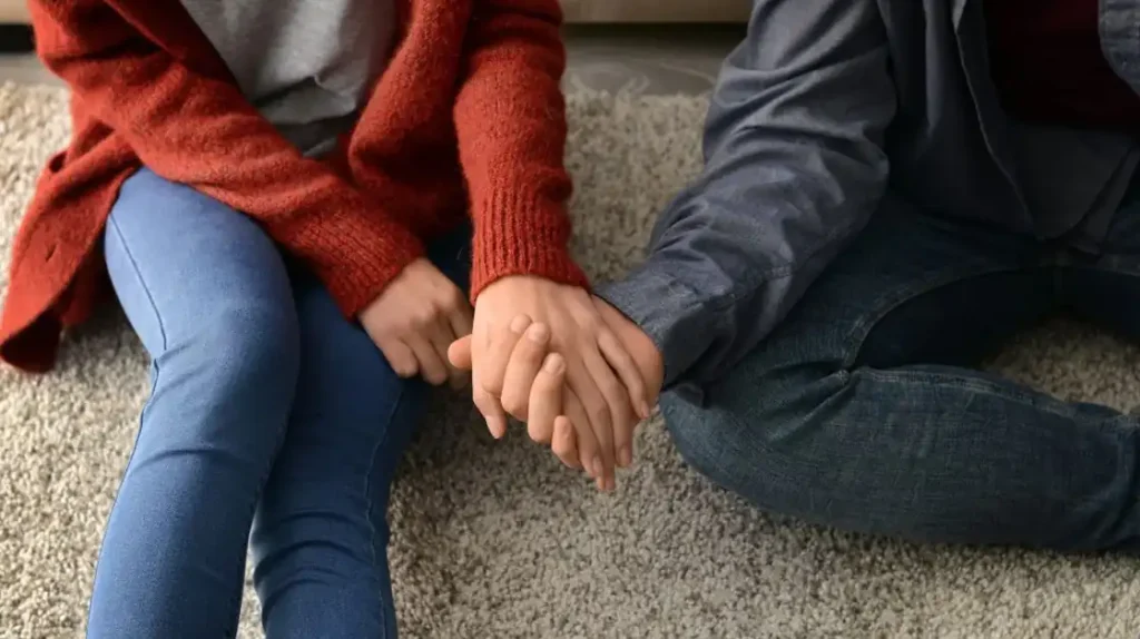 Coppia mano nella mano | Corpo e anima